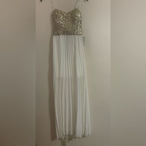Eloquent  Cream Gown with Gold Sequins Accents